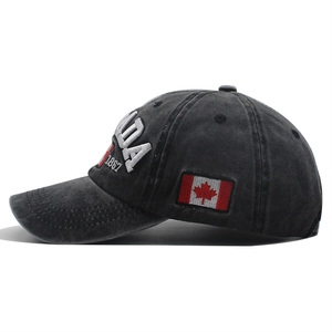 Dark grey cotton baseball cap with 3D Canada embroidery and red maple leaf flag patch
