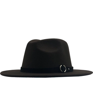 Detail of dark brown wool fedora with a black ribbon band and silver metallic ring buckle