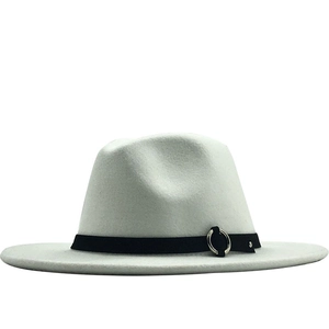 Close-up of light gray wool fedora hat with a flat wide brim and black band detail
