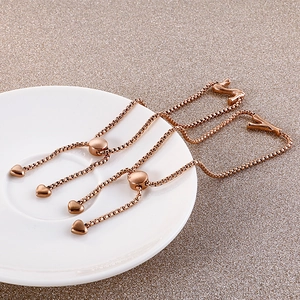 Bracelet ajustable en or rose avec breloque cœur et pendentifs lettres S et Y