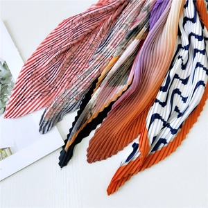 Fashionable pleated square scarves for women featuring various artistic patterns and colors
