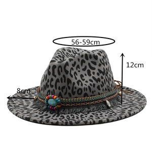 Detail view of grey leopard print fedora hat with ethnic beads and turquoise trim