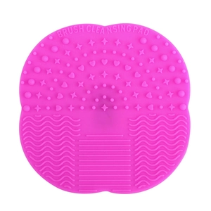 Pink silicone brush cleansing pad with heart shape and multiple cleaning textures