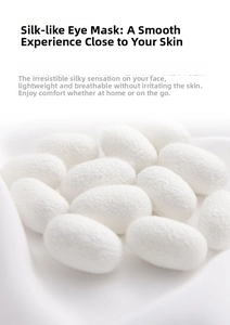 Close-up of white natural silk cocoons representing the raw premium material of sleep masks