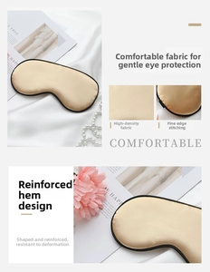 Detail of champagne silk eye mask showing high-density fabric and reinforced black edging