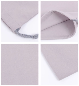 Detailed views of light purple cotton drawstring bag with fabric texture and stitching