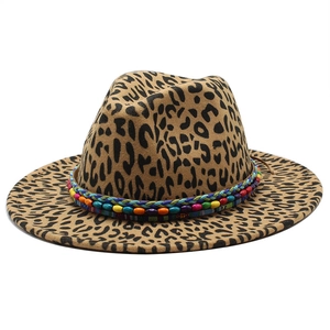 Detailed shot of leopard print wool fedora featuring a colorful beaded decorative band