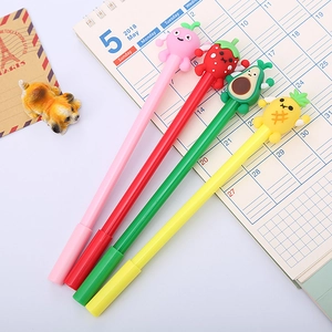 Cute fruit-themed gel pens set with silicone strawberry and avocado toppers on a desk