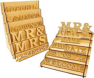 Close-up of laser-cut wooden letters and numbers on a 6-tier ladder display stand