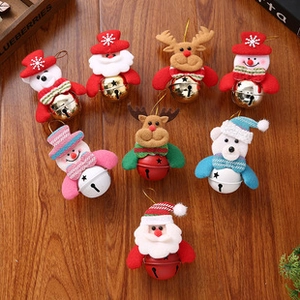 Macro shot of 8-piece Christmas bell ornaments with plush Santa, snowman, and reindeer