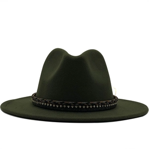 Detail of dark olive wool fedora with woven leather and rhinestone decorative band