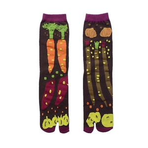 Japanese style jacquard split-toe tabi socks with colorful vegetable patterns on dark brown