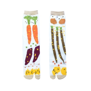 Detail of cotton Tabi socks featuring colorful carrot and vegetable jacquard patterns