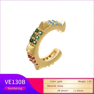 Gold brass ear cuff with pyramid studs and colorful cubic zirconia stones