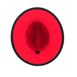 Detail of red and black fedora interior showing stitching and the made in china label