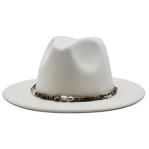 Detail of white wool fedora hat featuring an ethnic style beaded band with wooden beads