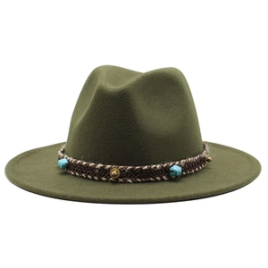 Detailed view of olive wool fedora with woven leather band and turquoise stone accents
