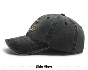 Side view of washed denim baseball cap with anchor embroidery and vintage texture