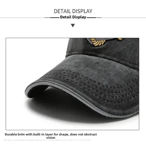 Detail of stone-washed denim baseball cap brim with six rows of reinforced stitching