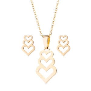 Close-up of golden hollow triple heart necklace and matching earrings jewelry set