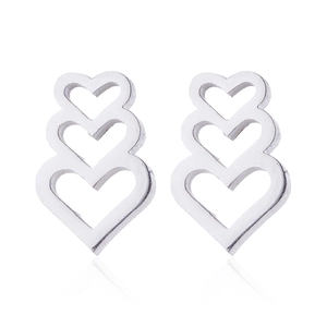Silver hollow heart-shaped earrings with a metallic stacked design on white background