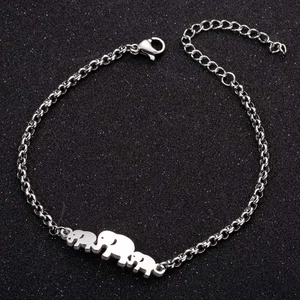 Elegant stainless steel elephant charm bracelet with adjustable chain on black background