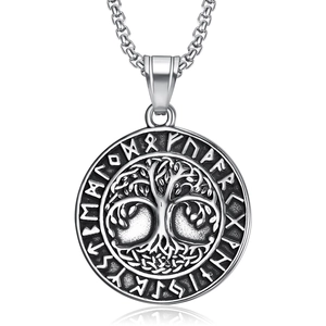 Macro view of vintage stainless steel Tree of Life pendant with Nordic runes detailing