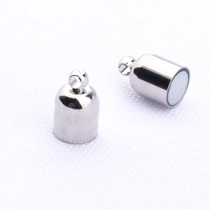 Close-up of polished silver magnetic clasp with ring attachment for jewelry making
