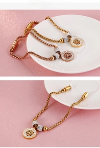 Detail of tree of life charm bracelets with magnetic clasp and rhinestones