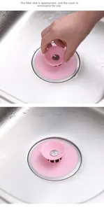 Pink silicone sink strainer with an easy-to-lift lid and optimized filter holes