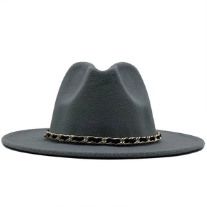 Close-up of gray wool fedora hat with gold braided chain detail and classic dented crown