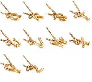 Detailed grid showing golden bamboo initial necklaces with sparkling crystal charms