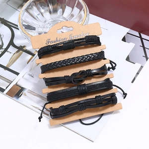 Set of 6 black leather braided multi-layer bracelets on a fashion jewelry display card