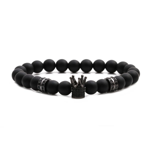 Matte black stone beaded bracelet with crown charm and micro-pave crystals