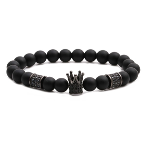 Matte black stone bead bracelet featuring a micro-pave black zircon crown charm