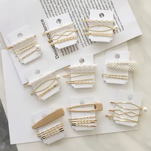 Elegant Korean style pearl and gold metal hair clip sets displayed on white cards