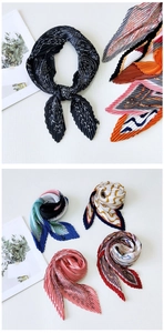 Detail showing pleated texture and diverse print patterns on chic square silk scarves
