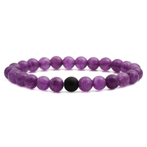 Matte black stone and purple amethyst beaded bracelet set on a clean white background