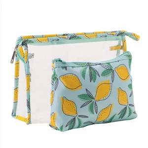 Detail of PVC makeup bag set featuring lemon patterns and transparent waterproof design