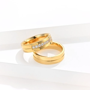Macro view of 18K gold plated titanium rings with pavé set cubic zirconia diamonds