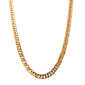 Macro detail of 8mm gold-plated stainless steel Cuban link chain with high-polish finish