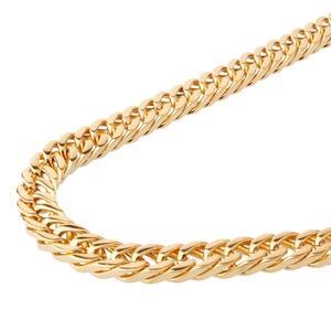 Macro shot of 8mm gold cuban link chain showing polished dual-weave stainless steel detail
