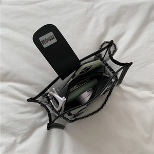 Trendy transparent PVC crossbody bag with black leather trim and metal chain strap
