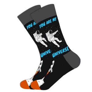 Space themed black cotton crew socks featuring astronauts, rockets and stars pattern