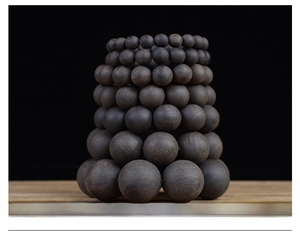 Various sizes of ebony wood beads from 10mm to 30mm diameter for jewelry making