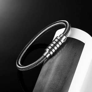 Minimalist black and white woven stainless steel men's bracelet with magnetic clasp