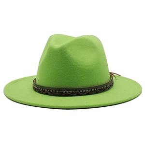 Detail shot of bright green fedora hat featuring a woven decorative band texture