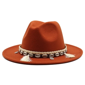 Caramel orange wool fedora hat with ethnic bohemian tassels and seashell band