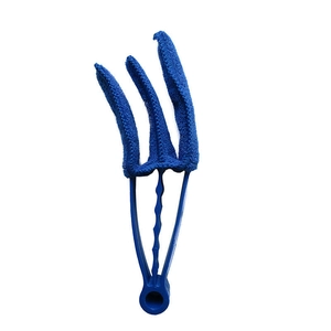 Detail view of the blue plastic window blind cleaner with three soft microfiber brushes