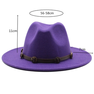 Close-up of purple fedora hat with brown leather band and size specification marks